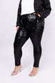 Modelo Victoria usa calça bordada luna na cor preta. Peça super confortável. Ideal para ir em festas ou em eventos especiais.