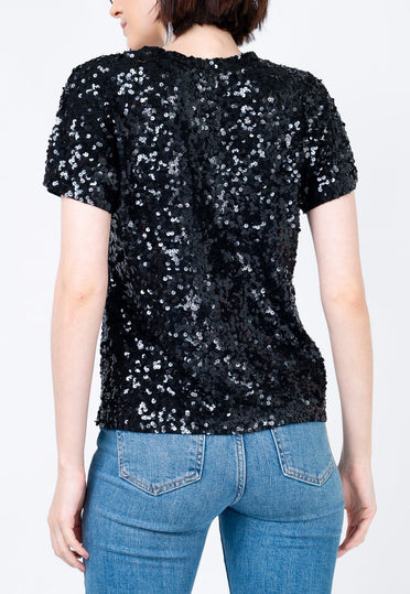 Costas da blusa manga curta decote v luna na cor preto com bordado feito à mão por toda peça ideal para festas e eventos